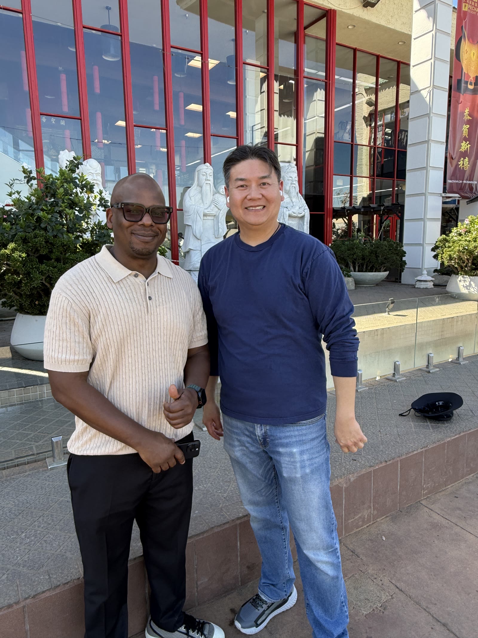 Tour participants outside a Little Saigon cultural storefront